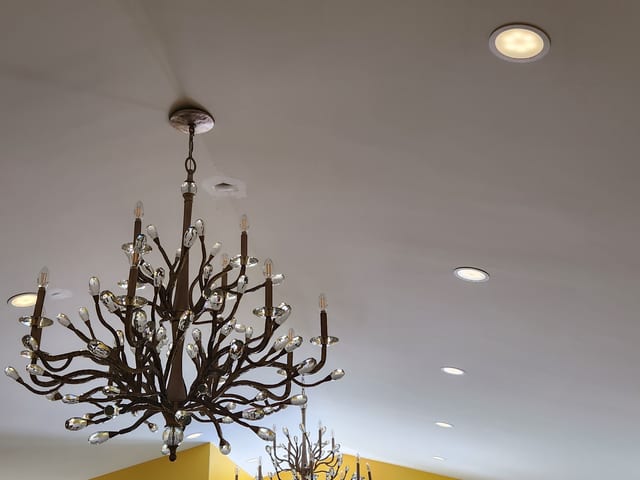 Chandelier hung and wired