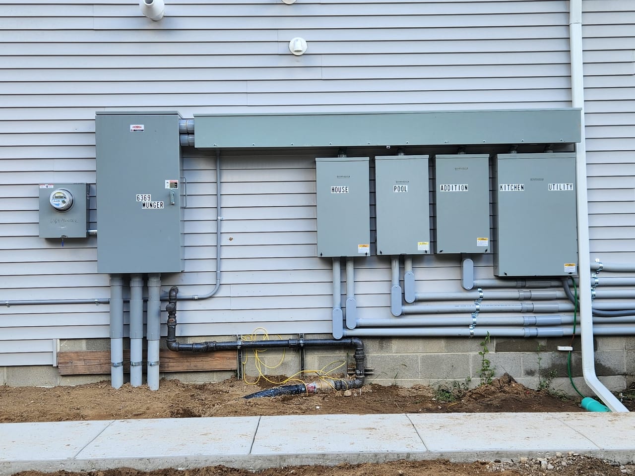 Commercial multi-meter service wall installed by 3D Electric